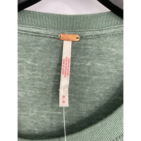 Free People NWT Fall in Love Lace Inset Ruffle Bottom Tee Washed Army Medium New - Picture 5 of 10